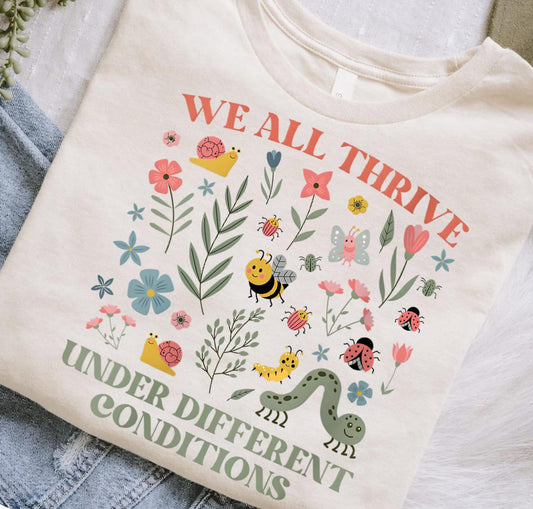 We all thrive Tee